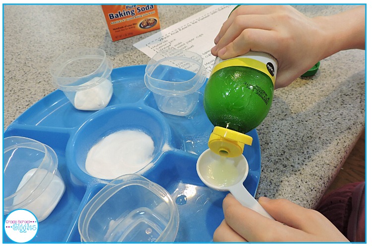 Picture of a student mixing baking soda and lemon juice